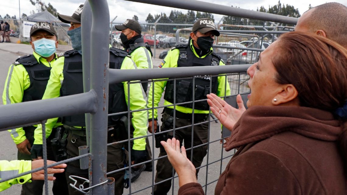 Relatives of inmates demand news of their loved ones after fresh clashes between prisoners were reported at the Regional Sierra Centro Norte Cotopaxi prison, in Latacunga, Ecuador, on October 4, 2022.