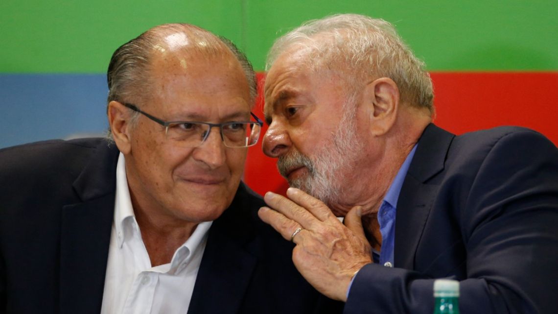 Brazilian former president (2003-2010) and candidate for the leftist Workers' Party (PT), Luiz Inácio Lula da Silva (right), speaks with his vice-presidential candidate Geraldo Alckmin (left) during a meeting with Governors and Senators from different parties ahead the run-off in São Paulo, Brazil, on October 5, 2022.