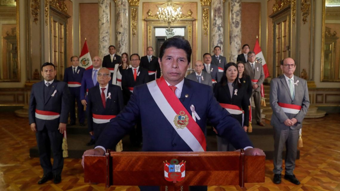 Peruvian President Pedro Castillo delivering a message to the nation from the Palace of Government accompanied by his ministerial team in Lima on October 19.