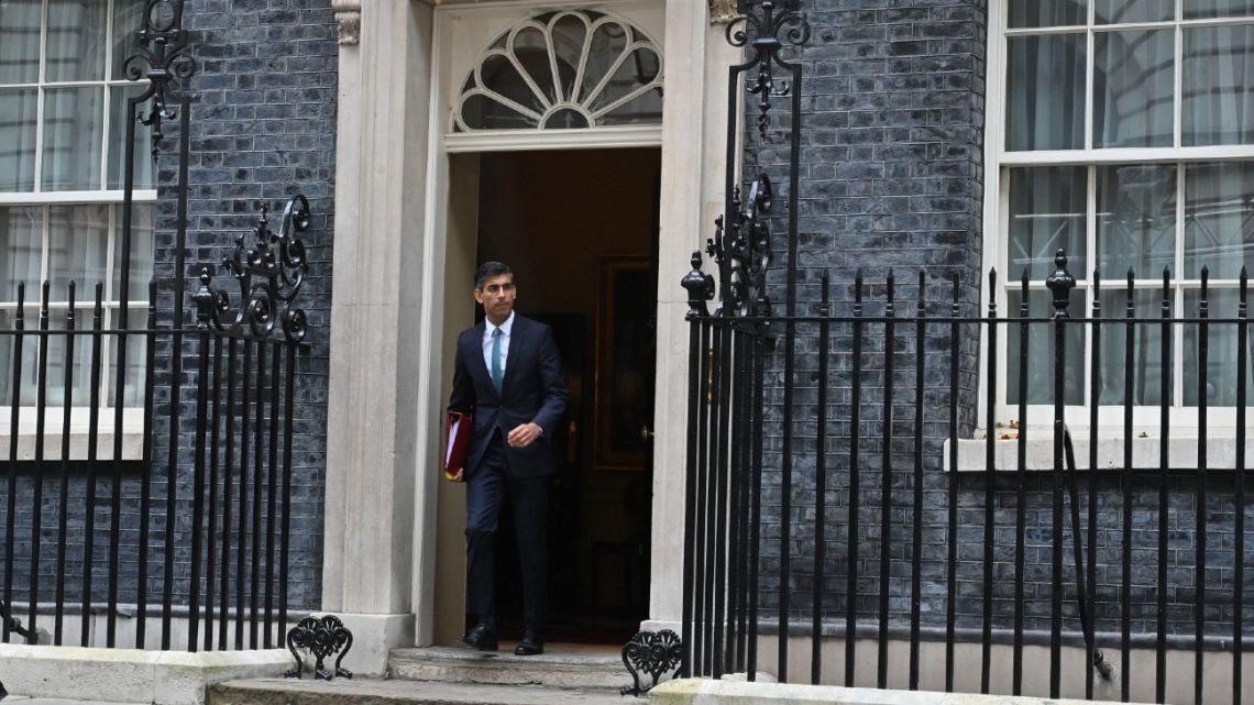 Britain's Prime Minister Rishi Sunak leaves 10 Downing Street in central London on October 26, 2022, for the House of Commons to take part in his first Prime Minister's Questions (PMQs). 
