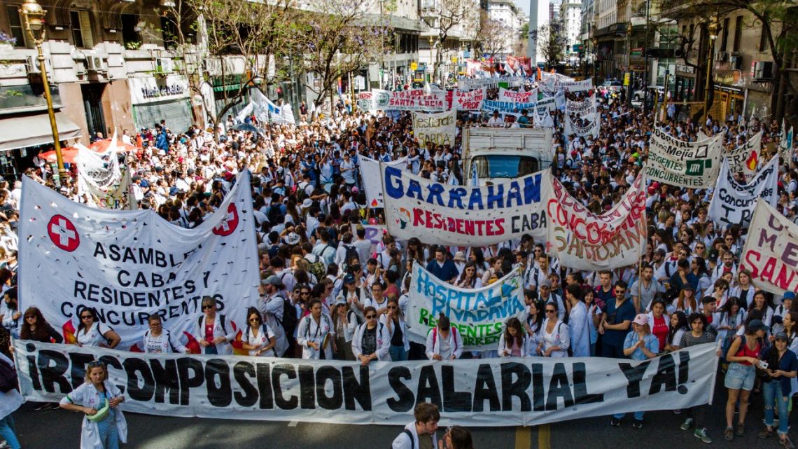 Resident doctors and health workers take part in a protest demanding salary increases, new staff and better working conditions amid the country's rising inflation rate that is projected to reach 100 percent this year, on November 8, 2022 in Buenos Aires, Argentina. 