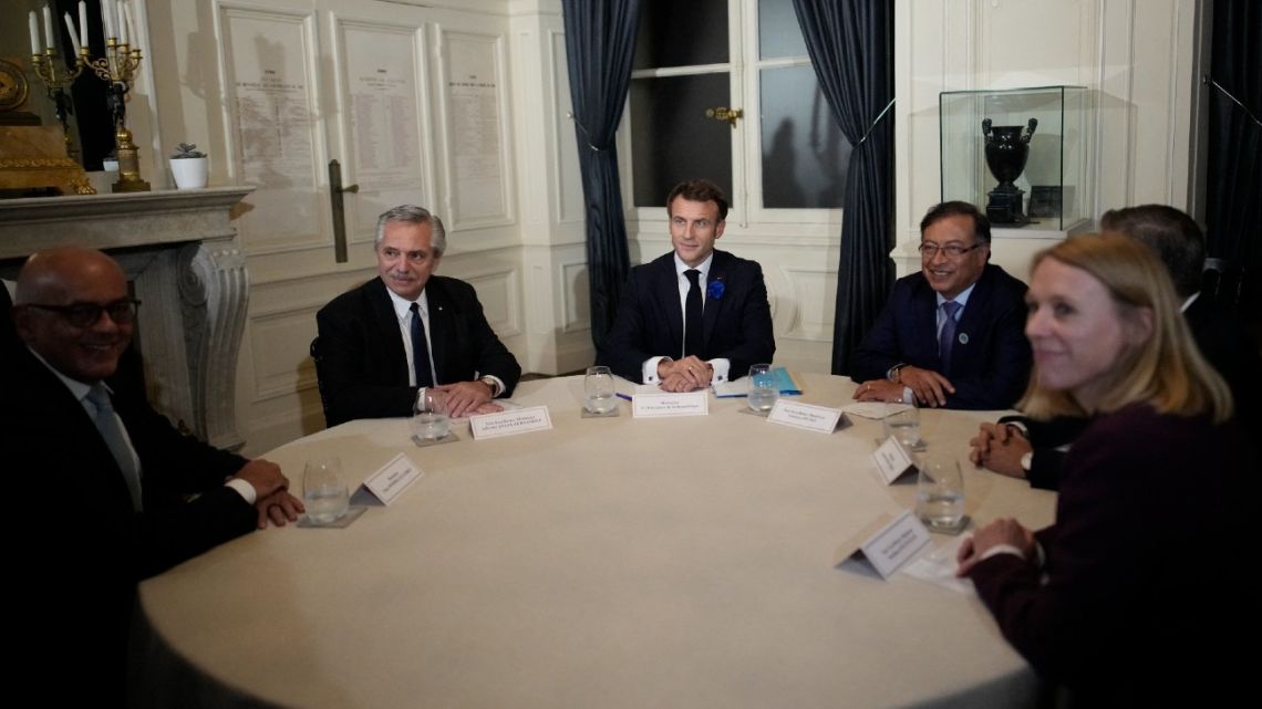 France's President Emmanuel Macron (centre) holds a meeting with Argentina's President Alberto Fernández (second-left) and Colombia's President Gustavo Petro (second-right) at the Peace Forum in Paris on November 11, 2022. 