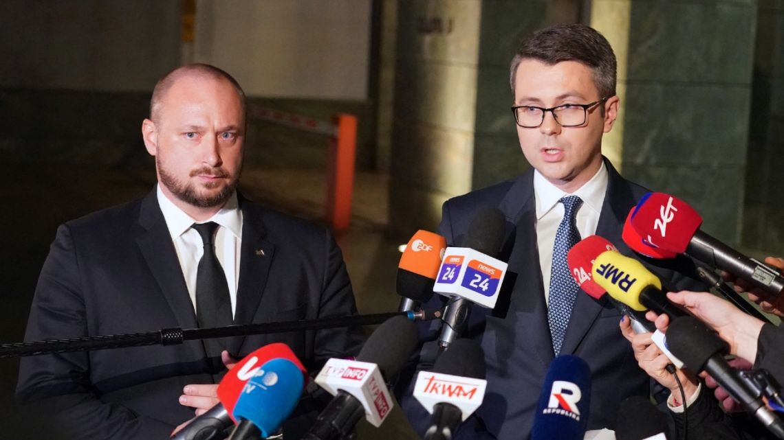 Head of the Office of National Security, Jacek Siewiera (L), and Spokesperson of the Polish government, Piotr Muller, make a statement after a crisis meeting of the Office of National Security, in Warsaw, on November 15, 2022. 