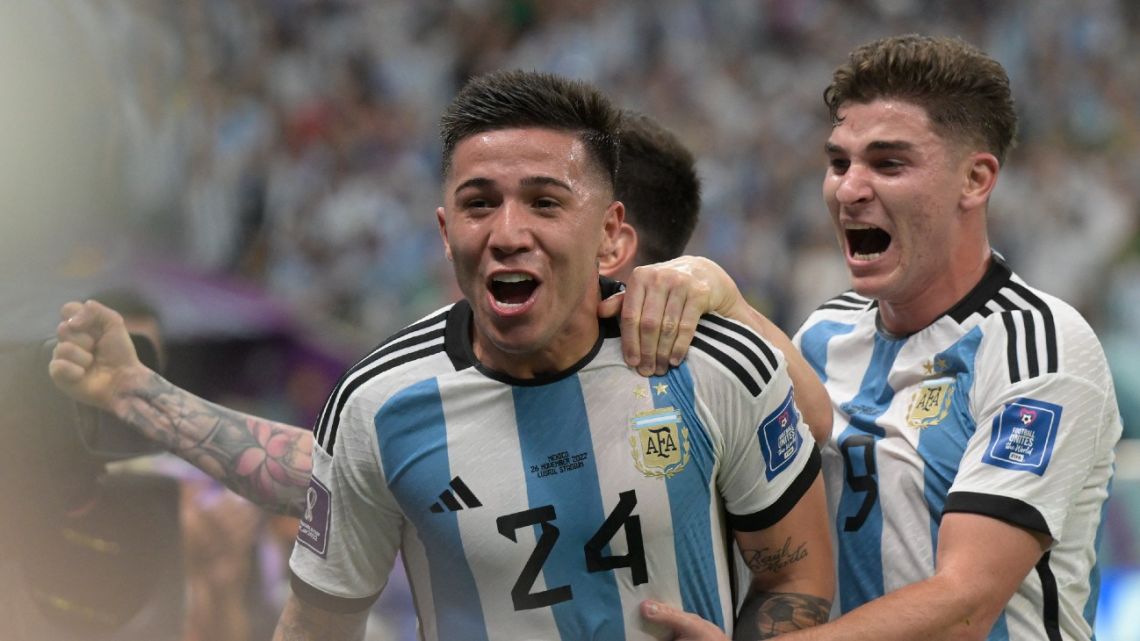 Argentina's midfielder #24 Enzo Fernández celebrates scoring his team's second goal with his teammates during the Qatar 2022 World Cup Group C football match between Argentina and Mexico at the Lusail Stadium in Lusail, north of Doha on November 26, 2022. 