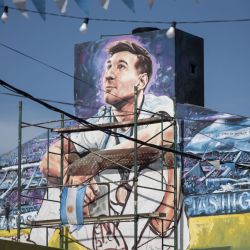 Vista de un mural que representa a Lionel Messi en su casa de la infancia en Rosario. | Foto:MARCELO MANERA / AFP