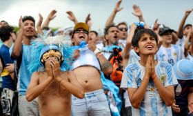 Argentina fans cheer on the team at a World Cup screening in Buenos Aires.