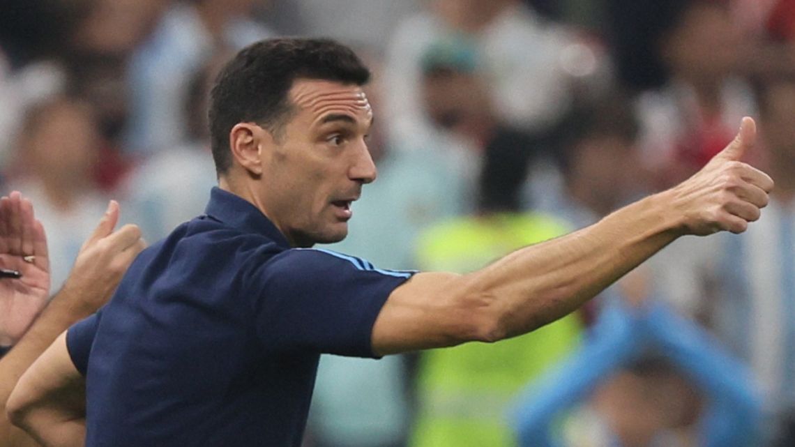 Lionel Scaloni gestures to his players from the touchline during the Qatar 2022 World Cup football semi-final match between Argentina and Croatia at Lusail Stadium in Lusail, north of Doha on December 13, 2022. 