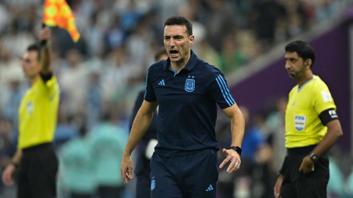 Argentina's coach Lionel Scaloni reacts on the touchline during the Qatar 2022 World Cup football semi-final match between Argentina and Croatia at Lusail Stadium in Lusail, north of Doha on December 13, 2022. 