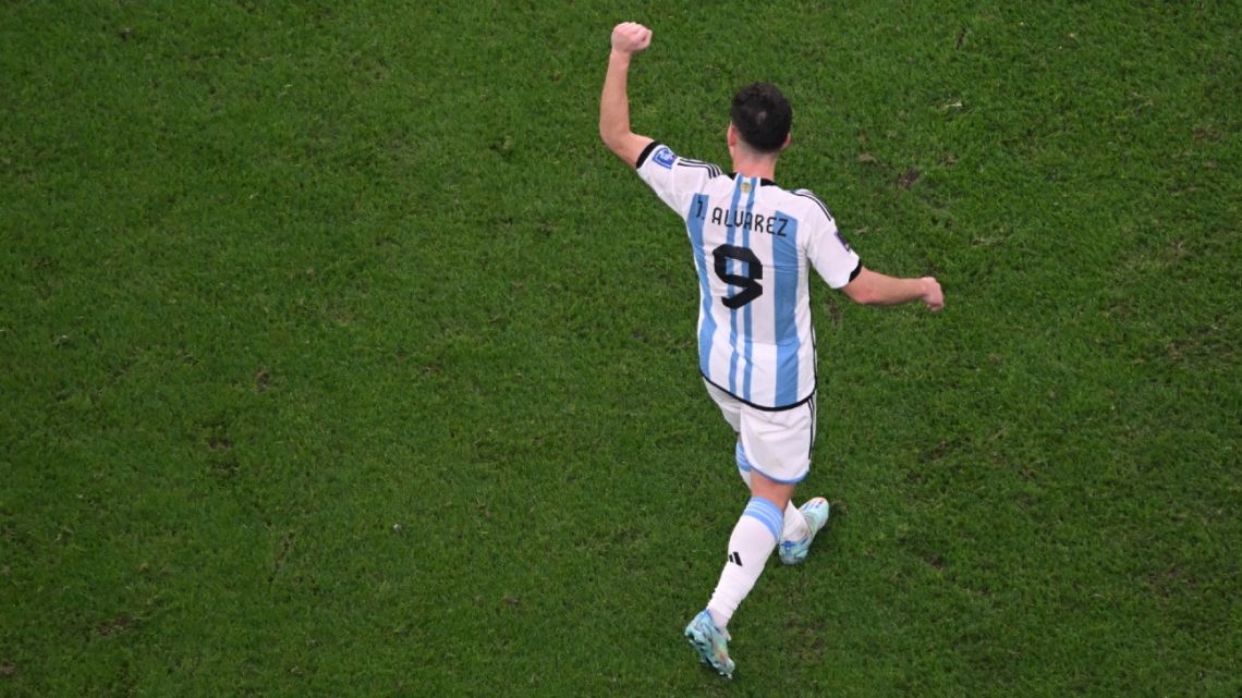Argentina's forward #09 Julián Álvarez celebrates scoring his team's second goal during the Qatar 2022 World Cup football semi-final match between Argentina and Croatia at Lusail Stadium in Lusail, north of Doha on December 13, 2022. 