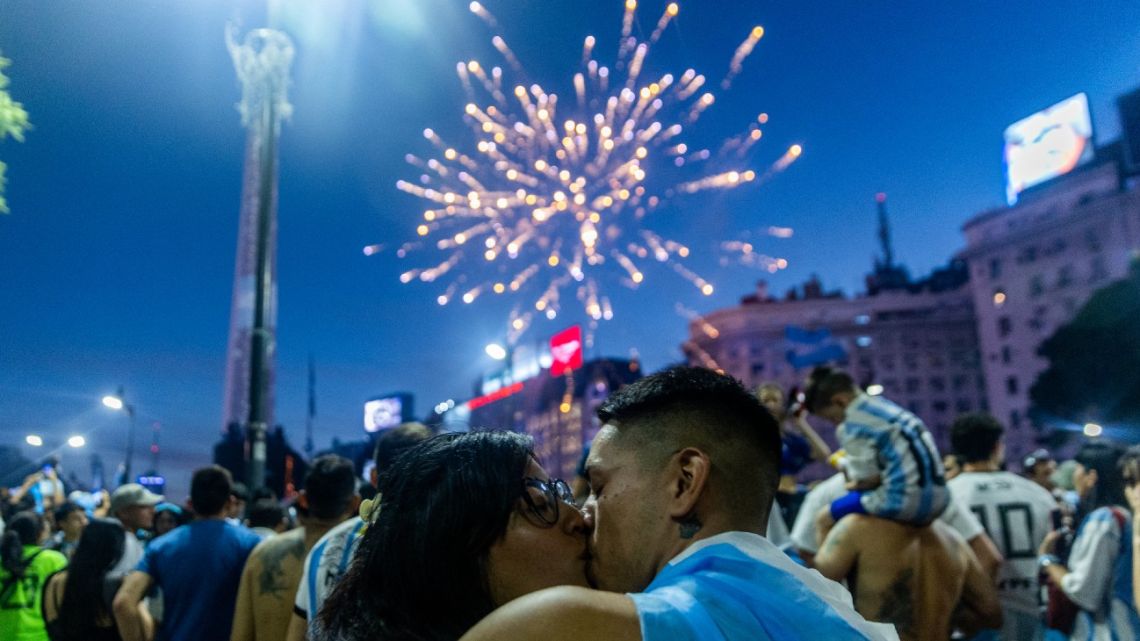 Fans of Argentina celebrate winning the Qatar 2022 World Cup against France at the Obelisk in Buenos Aires, on December 18, 2022. 