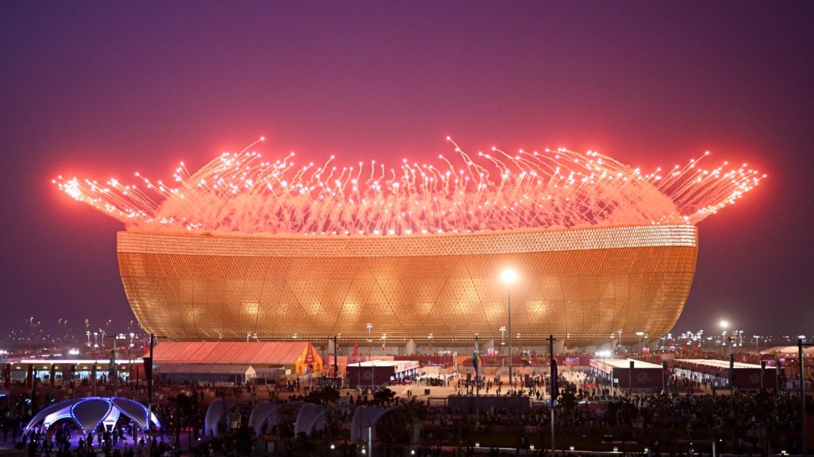 Fireworks are pictured before the start of the Qatar 2022 World Cup final football match between Argentina and France at Lusail Stadium in Lusail, north of Doha on December 18, 2022. 