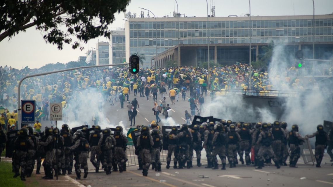 Supporters of former Brazil President Jair Bolsonaro storm the country’s top government institutions.