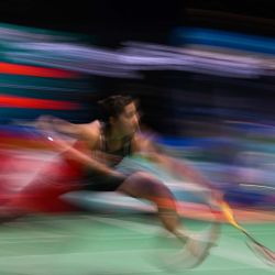 Carolina Marin de España corre para regresar contra Chen Yu Fei de China durante su partido de cuartos de final de individuales femeninos en el torneo de bádminton Abierto de Malasia en Kuala Lumpur. Foto de Mohd RASFAN / AFP | Foto:AFP