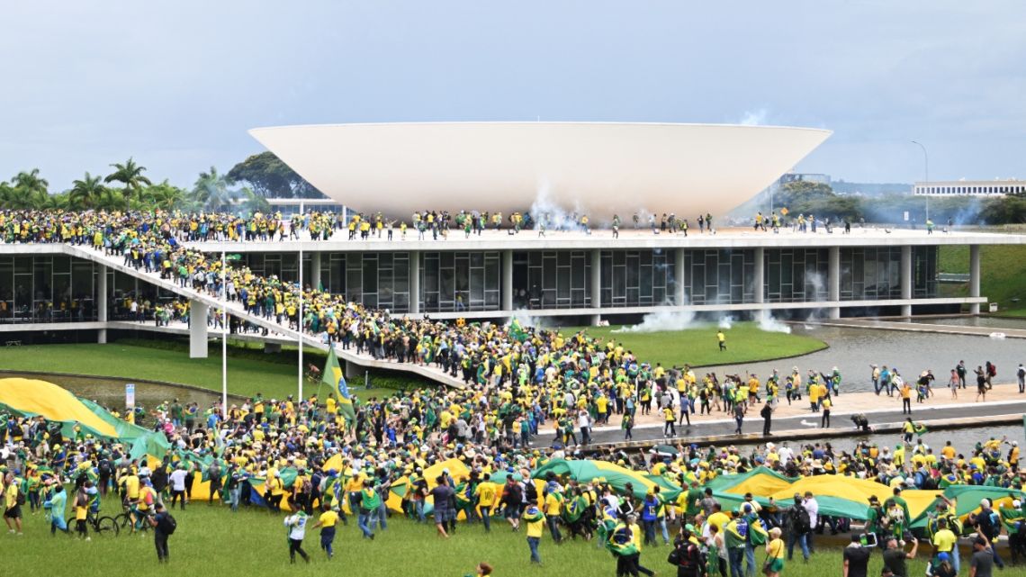 Supporters of Brazilian former President Jair Bolsonaro hold a demonstration at the Esplanada dos Ministerios in Brasilia, January 8, 2023.