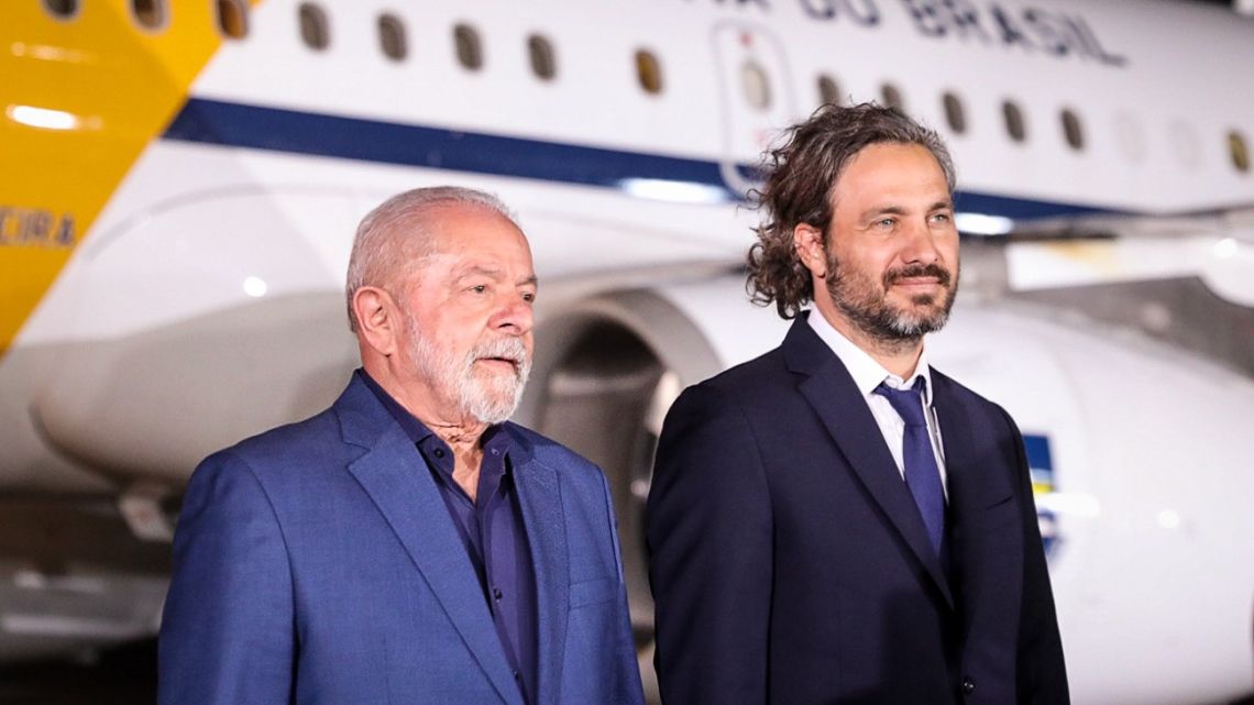 Brazil President Luiz Inácio Lula da Silva is pictured alongside Foreign Minister Santiago Cafiero as he arrives in Argentina on Sunday, January 22, 2023.