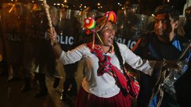 An indigenous woman shouts slogans during a protest demanding the resignation of Peru's President Dina Boluarte in Lima on January 23, 2023.