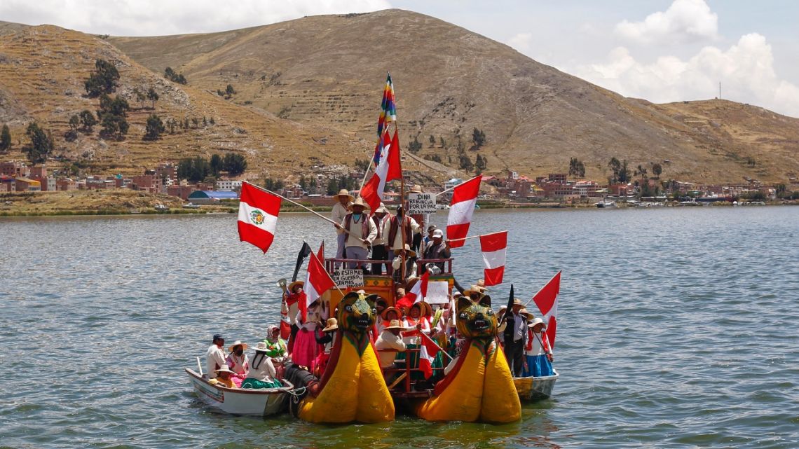 People of the Uros and Taquile islands on Lake Titicaca, on the border with Bolivia, arrive at the city of Puno, Peru, to take part in a protest against the government of Dina Boluarte