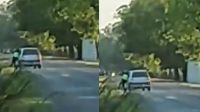 Arrastró a la policía que colgaba de la ventana