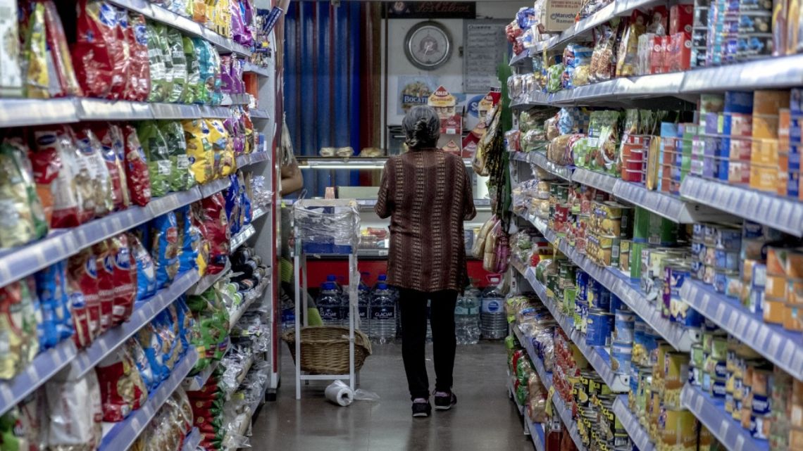 A shopper, pictured inside a supermarket in Buenos Aires.