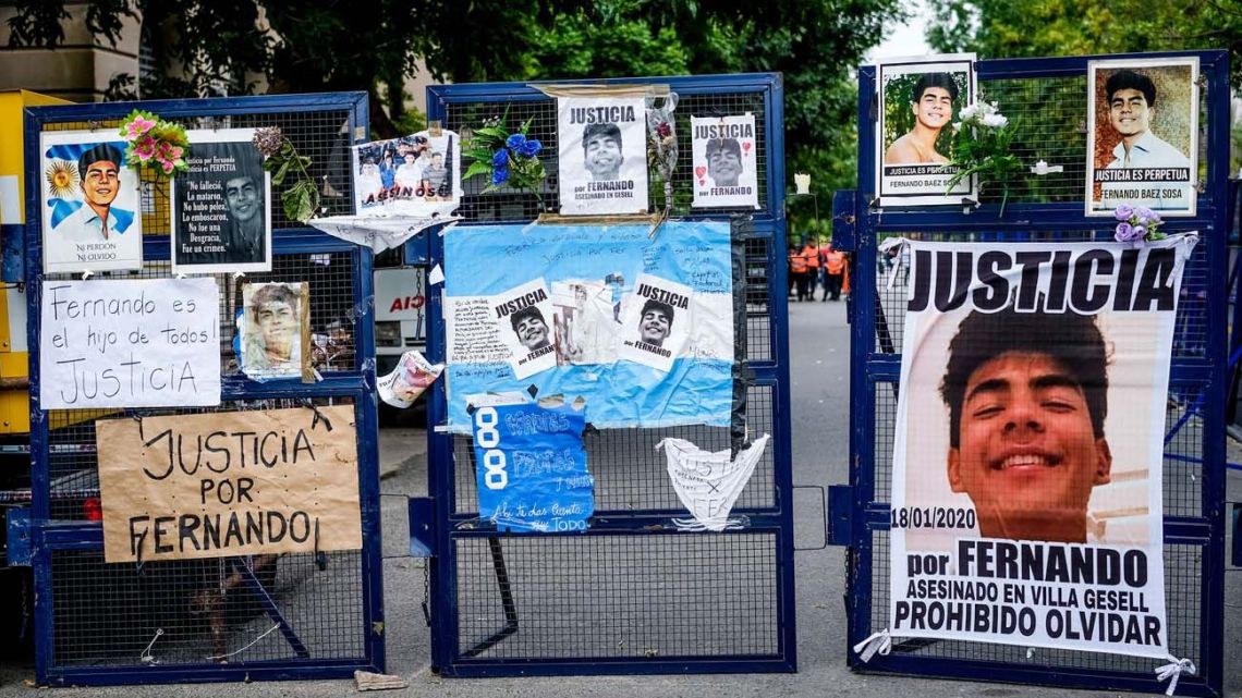 Posters demanding justice in the trial into the killing of Fernando Báez Sosa are pictured on security fences in the vicinity of the courthouse in Dolores where the trial took place.