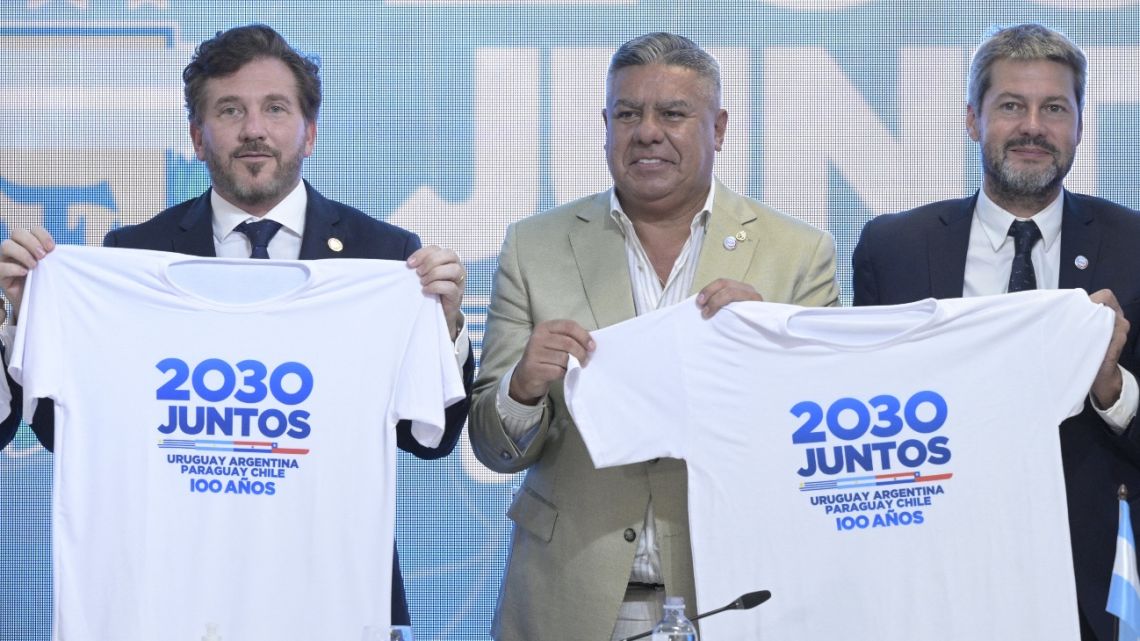 President of Conmebol Alejandro Dominguez (L), President of the Argentine Football Association Claudio "Chiqui" Tapia (C) and Argentine Tourism and Sports Minister Matias Lammens (R) pose for a picture during a press conference to launch the joint candidacy of Uruguay, Argentina, Chile and Paraguay to organize the 2030 World Cup at AFA's headquarters in Buenos Aires on February 7, 2023.