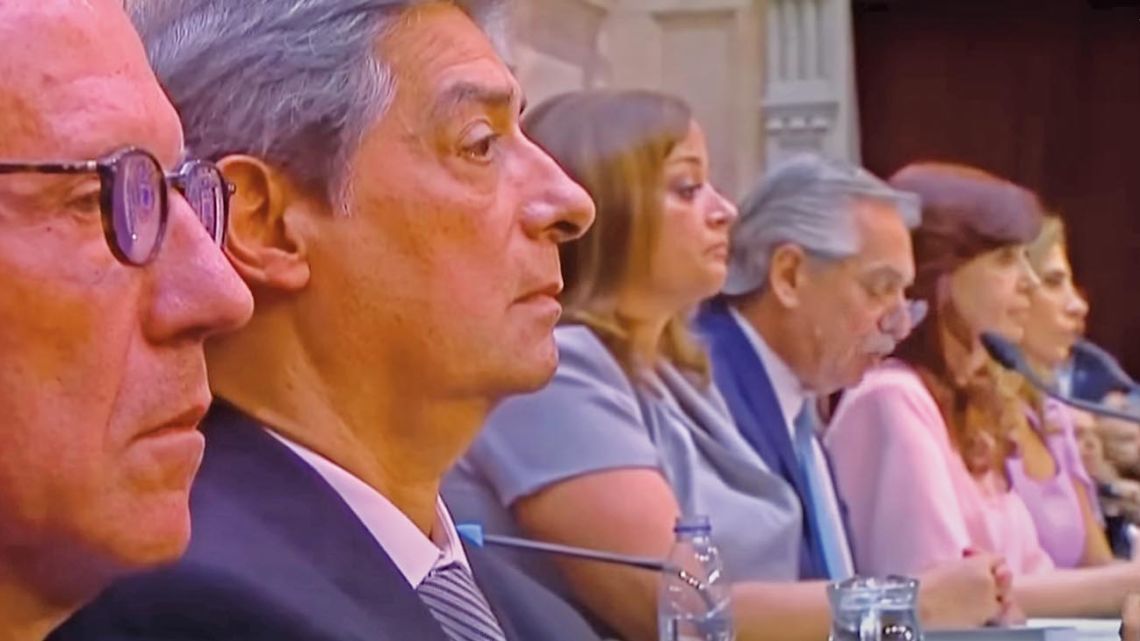 President Alberto Fernández delivers his annual speech to the legislative assembly, as Supreme Court justices Horacio Rosatti and Carlos Rosenkrantz (foreground) listen.