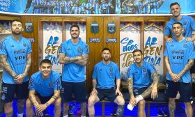 Argentina's World Cup-winning squad pose for a photograph at AFA's Ezeiza training complex.