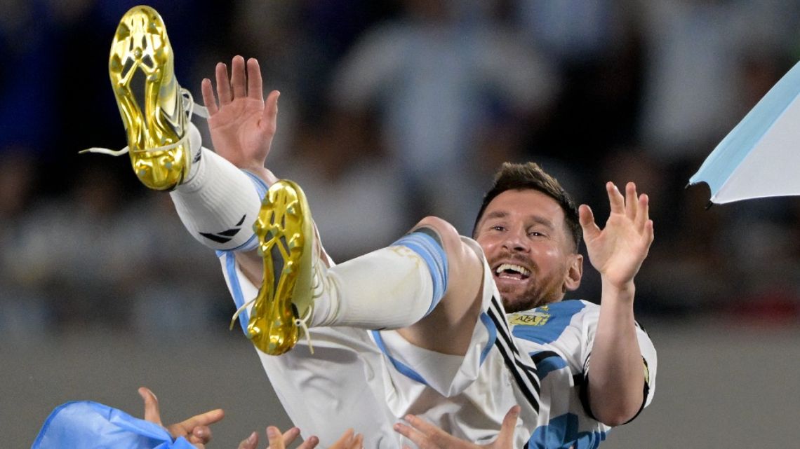 Argentina's forward Lionel Messi is lifted up by teammates during a recognition ceremony for the World Cup winning players, following the friendly football match between Argentina and Panama at the Monumental stadium in Buenos Aires on March 23, 2023. Lionel Messi capped a night of unbridled joy with the 800th goal of his career as world champions Argentina celebrated their homecoming with a 2-0 friendly victory over stubborn Panama in Buenos Aires on Thursday. 