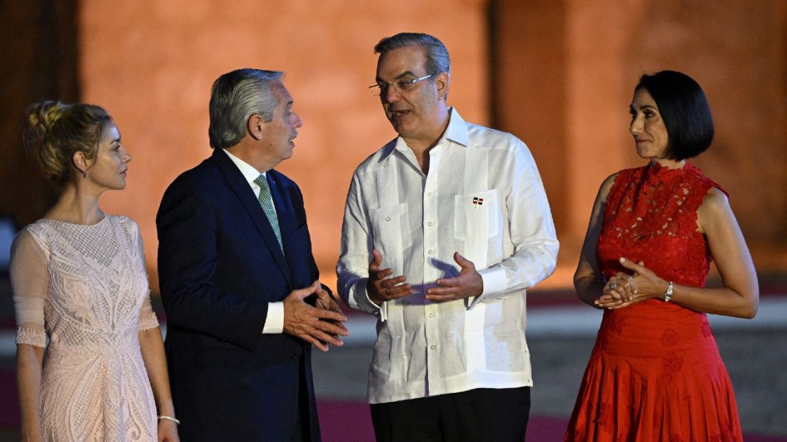 Argentine President Alberto Fernández, his partner Fabiola Yáñez, Dominican President Luis Abinader and his wife Raquel Arbaje chat before the inaugural act of the XXVIII Ibero-American Summit of Heads of State and Government at the Ozama Fortress in Santo Domingo on March 24, 2023. 