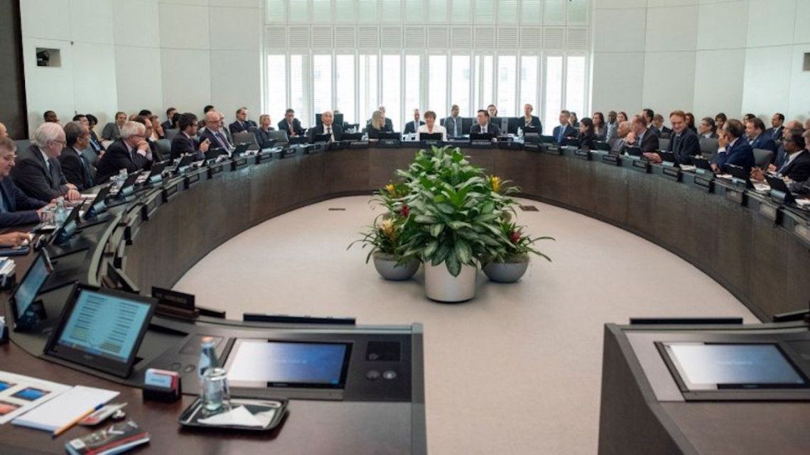 Members of the International Monetary Fund's Executive Board meet in Washington.