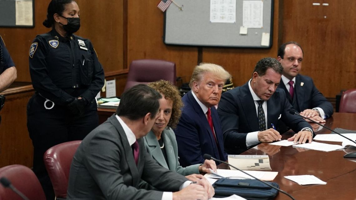 Former US president Donald Trump appears in court at the Manhattan Criminal Court in New York on April 4, 2023.