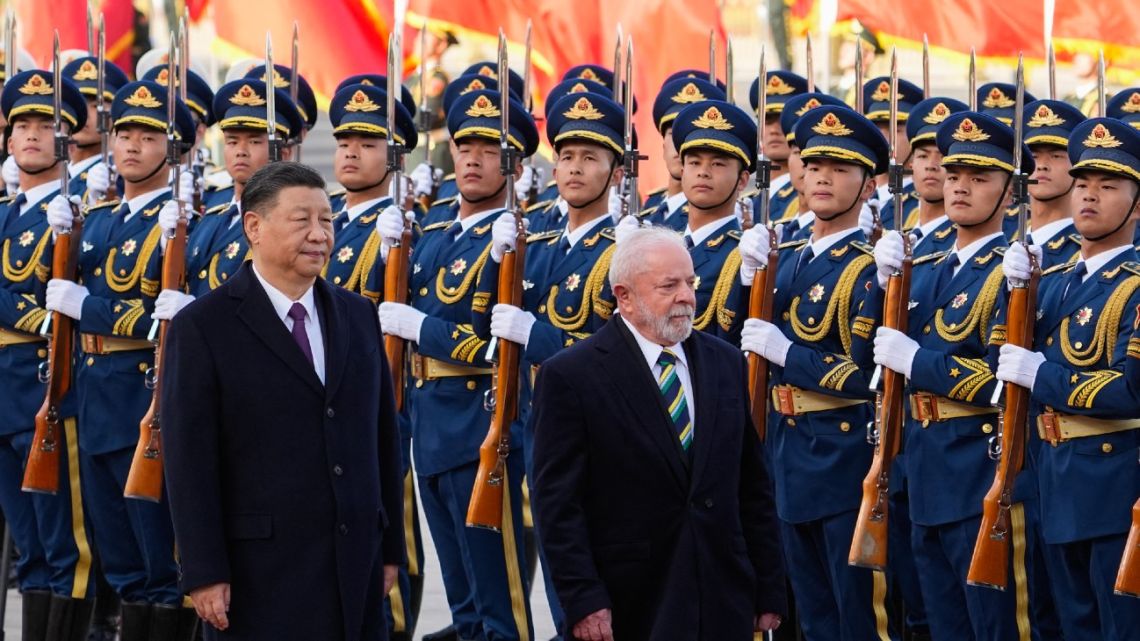 Chinese President Xi Jinping and Brazil's President Luiz Inácio Lula da Silva attend a welcome ceremony at the Great Hall of the People in Beijing on April 14, 2023. 