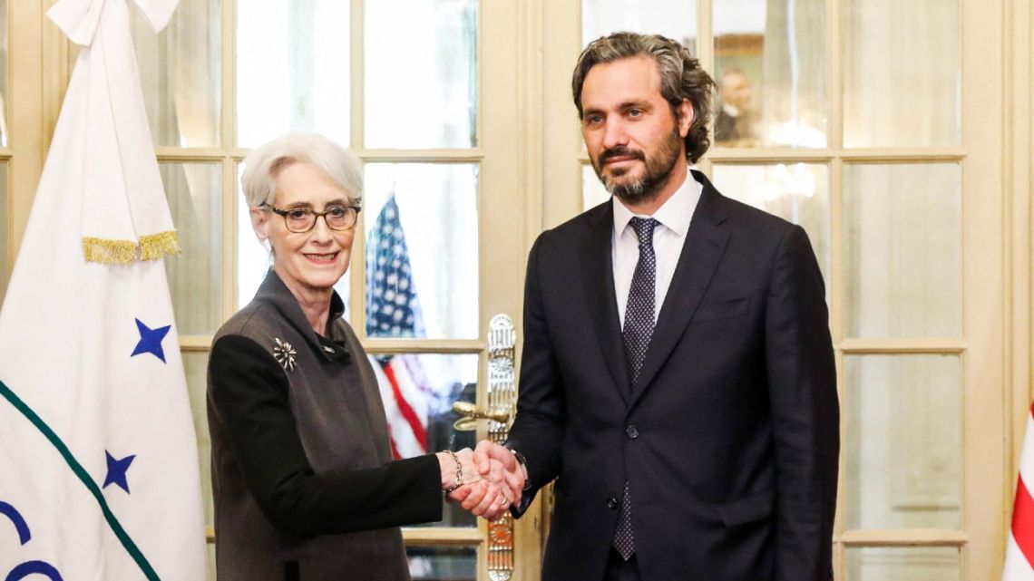 This handout picture released by the Foreign Ministry shows US Deputy Secretary of State Wendy Sherman (left) shaking hands with Argentine Foreign Minister Santiago Cafiero (right) at the Palacio San Martín in Buenos Aires on April 14, 2023. 