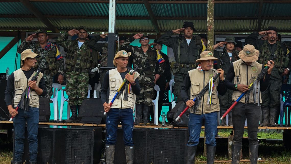 FARC-EP dissidence top commanders Ivan Mordisco (C), Calarca (3-R), Richard (R) and Andres Patino (L) attend a meeting with local communities in San Vicente del Caguan, department of Caqueta, Colombia on April 16, 2023.