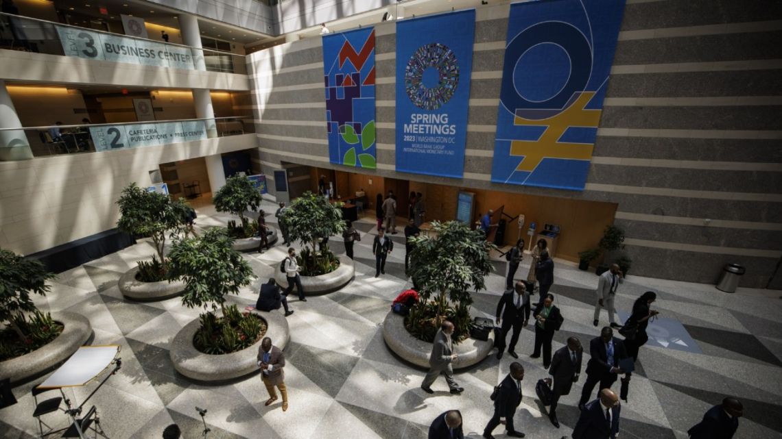 An International Monetary Fund (IMF) and World Bank spring meetings sign inside the IMF headquarters in Washington, DC, US, on Tuesday, April 11, 2023. 