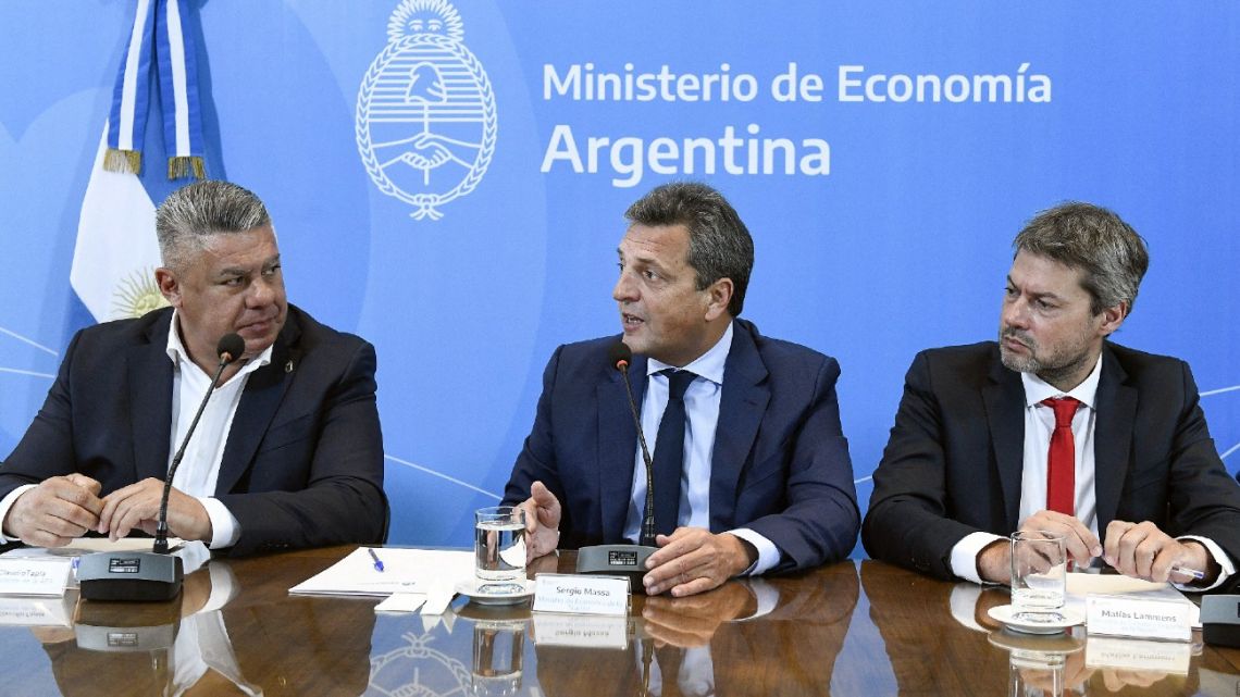 Handout photo released by the Economy Ministry shows Argentine Football Association (AFA) President Claudio Tapia, Economy Minister Sergio Massa and Tourism & Sports Minister Matías Lammens during a government broadcast in Buenos Aires on April 17, 2023.