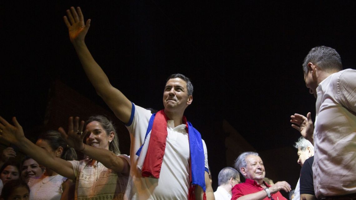 Santiago Peña celebrates his win in the Paraguayan election.