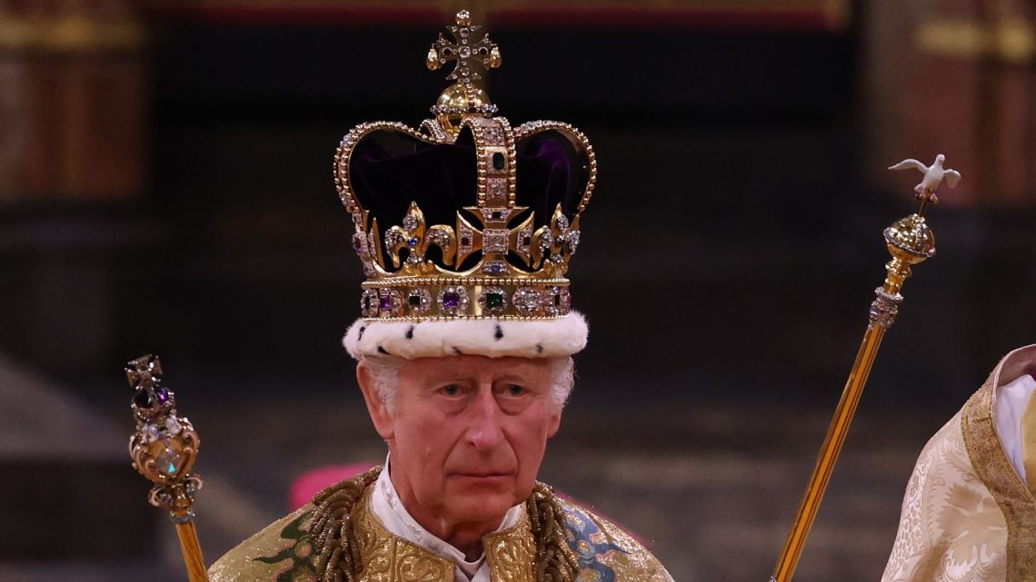 Britain's King Charles III with the St Edward's Crown on his head attends the Coronation Ceremony inside Westminster Abbey in central London on May 6, 2023.