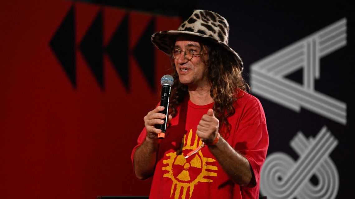 SingularityNET Founder and CEO Ben Goertzel performs along with the AI robot Desdemona (out of frame) during the Web Summit Rio 2023 at the RioCentro Expo Center in Rio de Janeiro, Brazil, on May 3, 2023. 