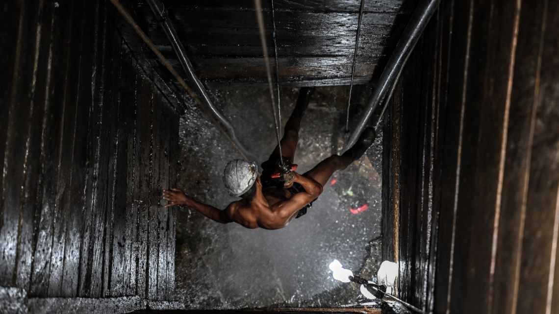 A miner works at an illegal copper mine, in Canaa dos Carajas, Para State, Brazil, on April 19, 2023.
