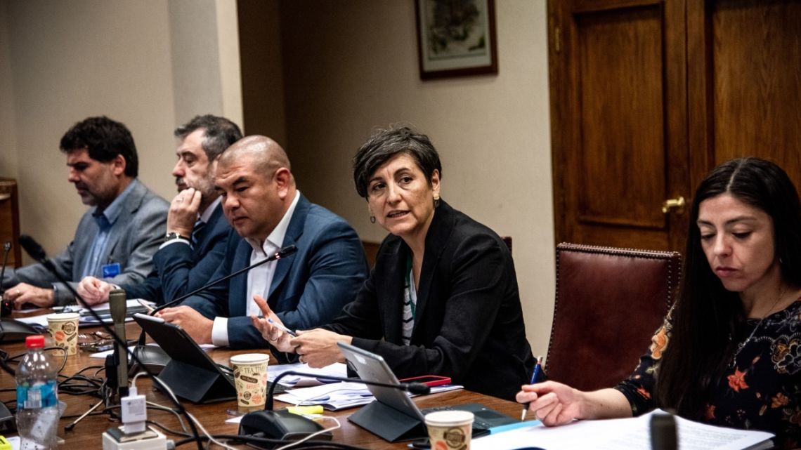Chile’s health minister, center, speaks alongside health regulator head Victor Torres at the National Congress building in Valparaiso, Chile, on Tuesday, March 7, 2023.