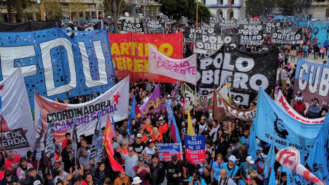 Aerial view of members of social organisations protesting against the agreements with the IMF and the reduction of social plans at the Plaza de Mayo square in front of the Casa Rosada in Buenos Aires on May 17, 2023, amid galloping inflation.