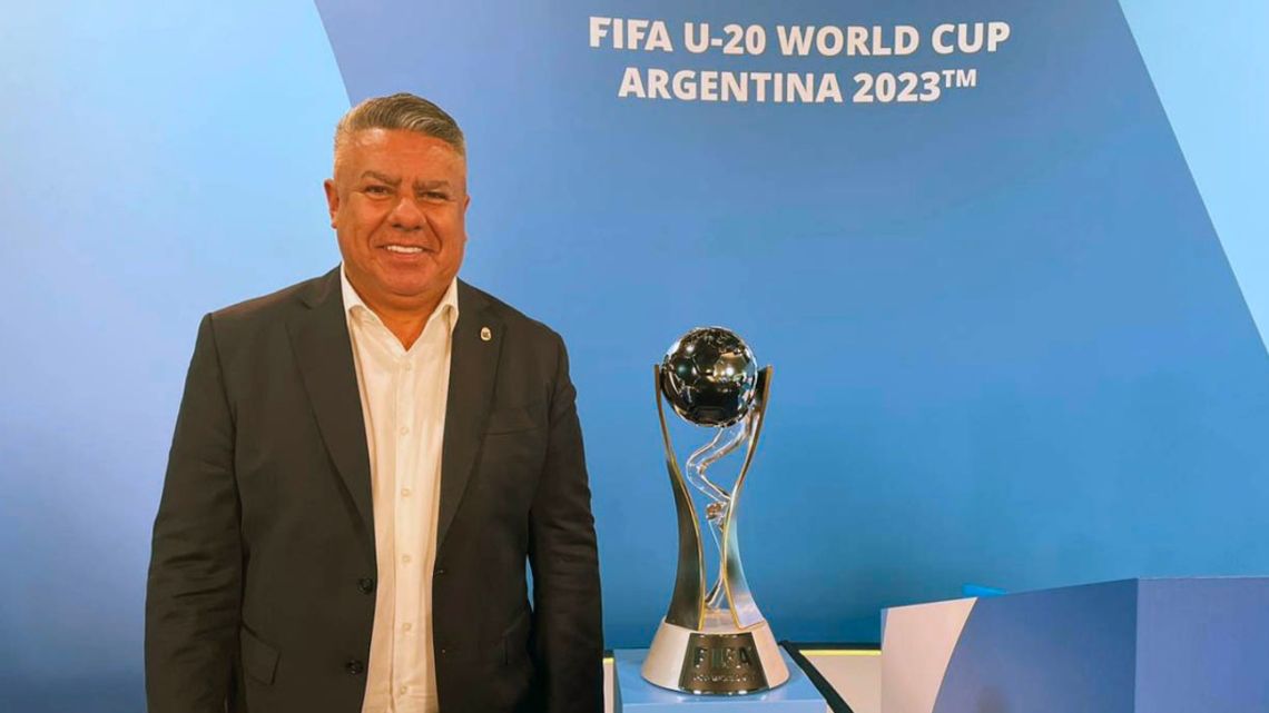 AFA President Claudio Tapia, pictured with the FIFA U20 World Cup trophy.