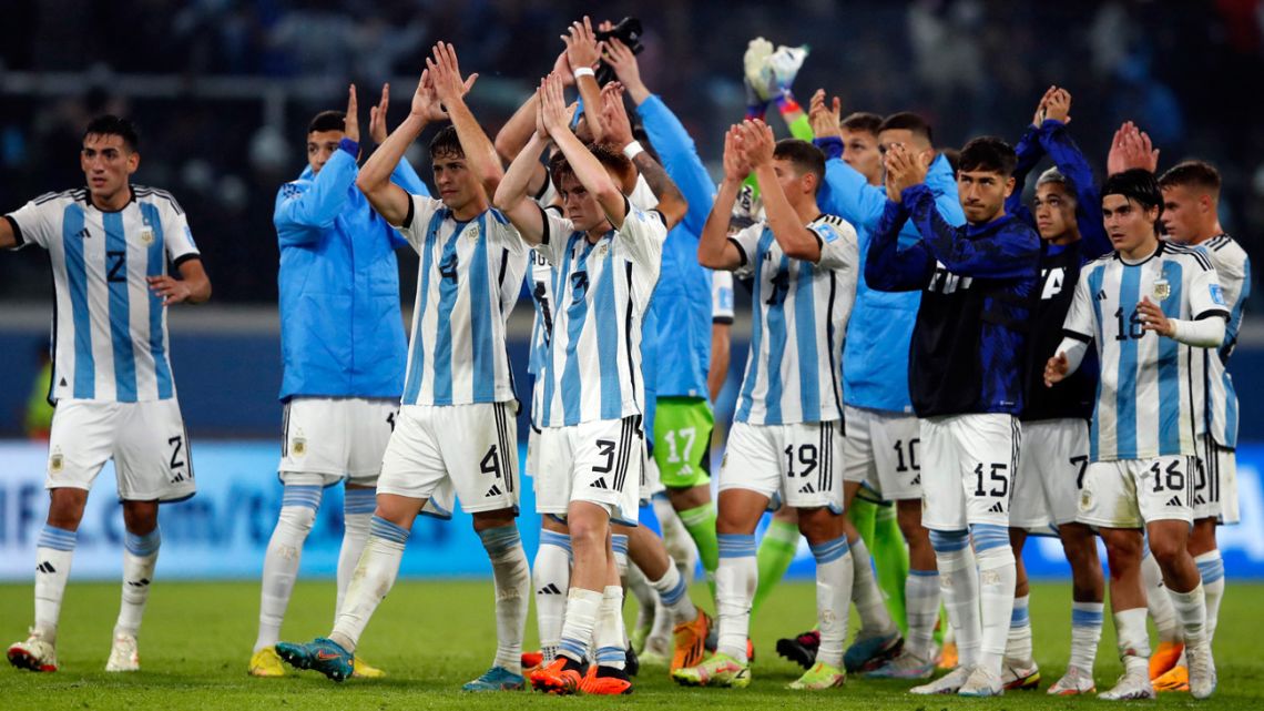 Argentina's players celebrate after defeating Uzbekistan during the Argentina 2023 U-20 World Cup Group A football match between Argentina and Uzbekistan at the Madre de Ciudades stadium in Santiago del Estero, Argentina, on May 20, 2023. 