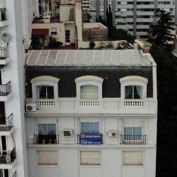 View of an apartment with a rent sign in Buenos Aires on May 22, 2023.