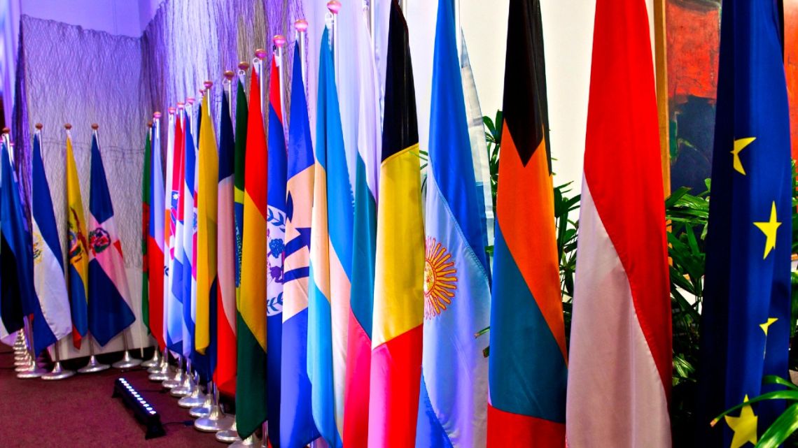 European Union and Mercosur member nation flags.