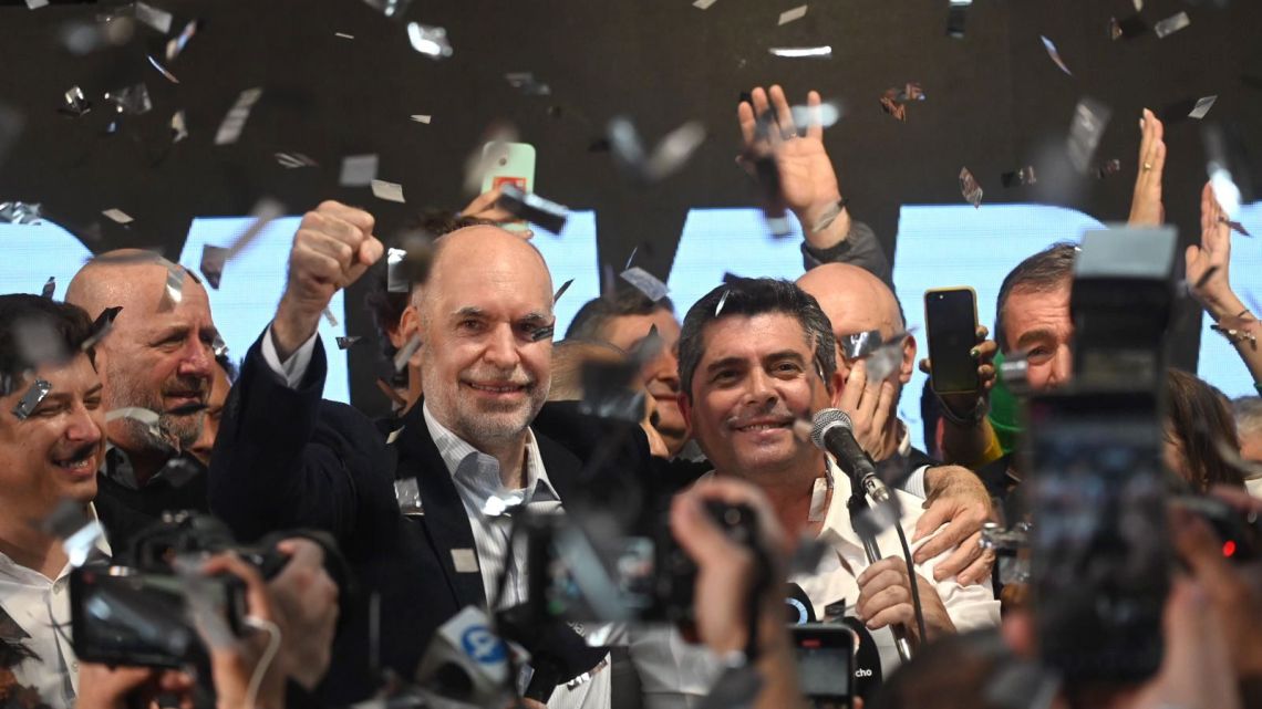 Marcelo Orrego celebrates onstage with opposition leader Horacio Rodríguez Larreta after the former's victory in the San Juan Province gubernatorial race, on Sunday, July 2, 2023.