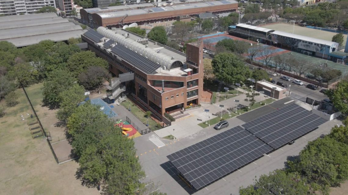 Solar panels on the rooftop and car park of a secondary school in Buenos Aires, Argentina. Many such projects allow users to generate their own electricity and sell surplus back to the grid.