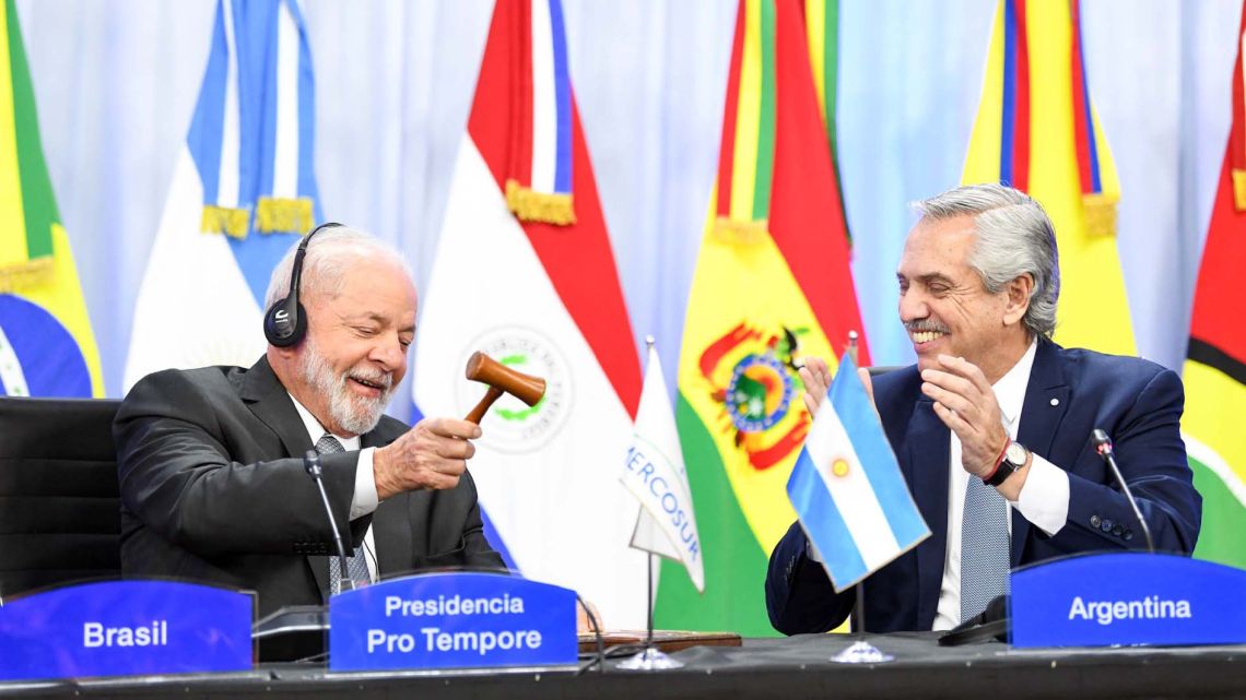 Brazil President Luiz Inácio Lula da Silva celebrates receiving the pro-tempore presidency of the Mercosur regional trade bloc from Argentina's President Alberto Fernández.