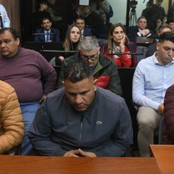 Gabriel Alejandro Isassi, Fabián Andrés López and Juan José Nieva, pictured in court as the day's hearing gets underway.